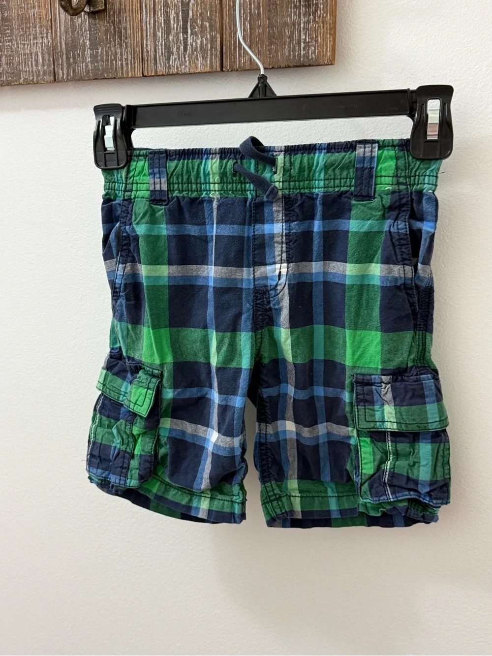 Gymboree boys green and navy blue plaid cargo shorts with an elastic waistband.